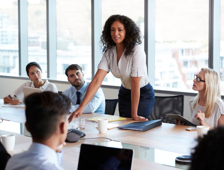 Lady leading her team in meeting