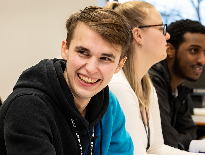 Students laughing in the University centre