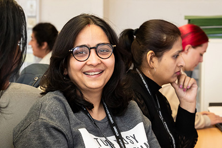 Students looking happy in a classroom